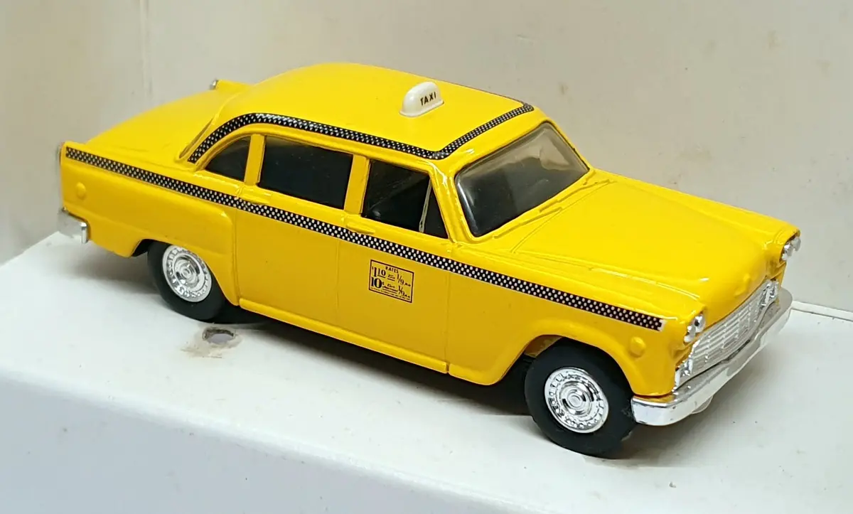 Ertl 1/43 Scale Diecast 2587 - Checker Taxi Cab - Yellow 1